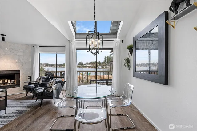 a kitchen with stainless steel appliances a sink stove and refrigerator