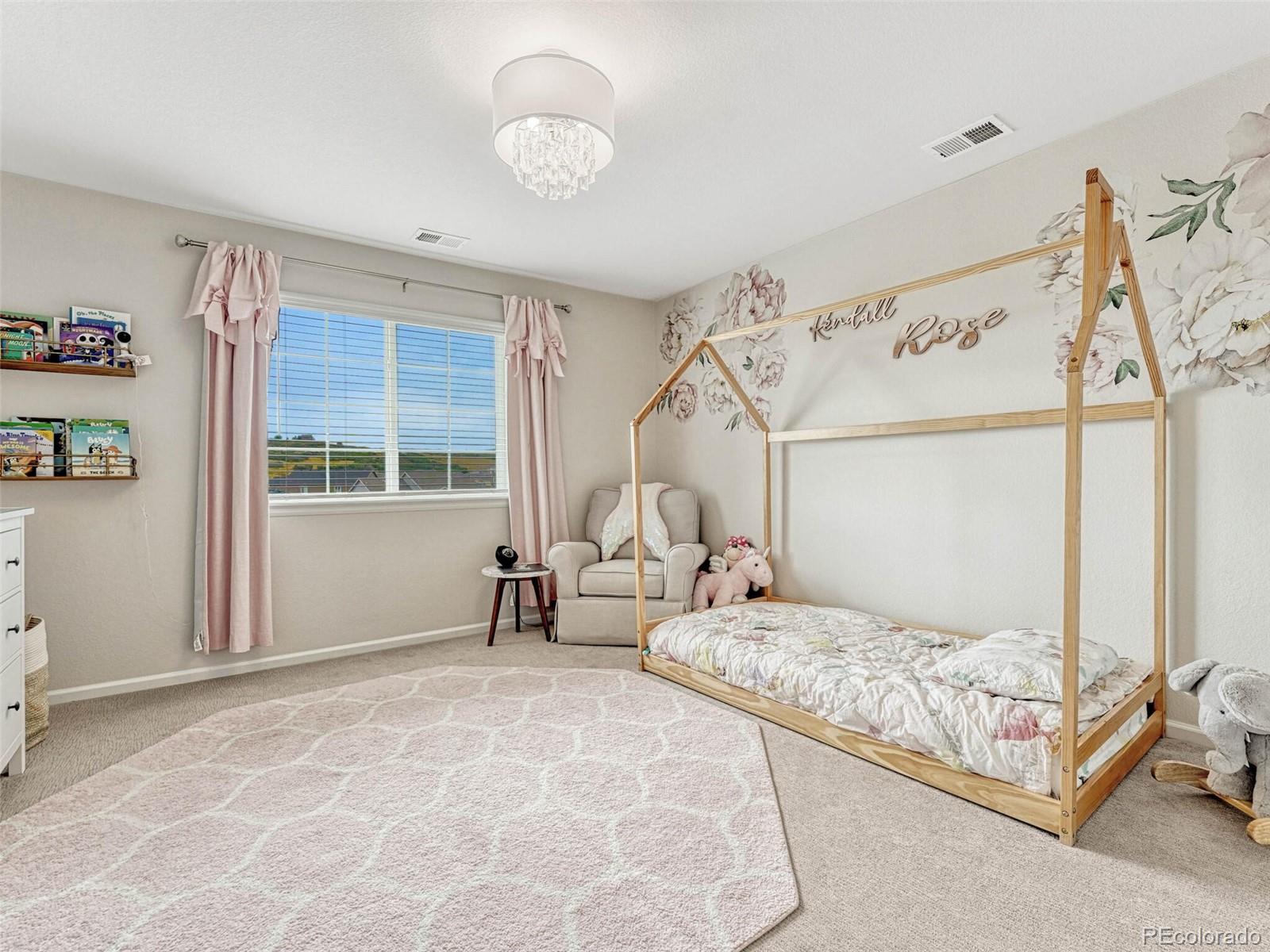 5921 Berry Ridge Wy. Castle Rock, CO 80104 - Photo 26 of 43 a bedroom with bed and window