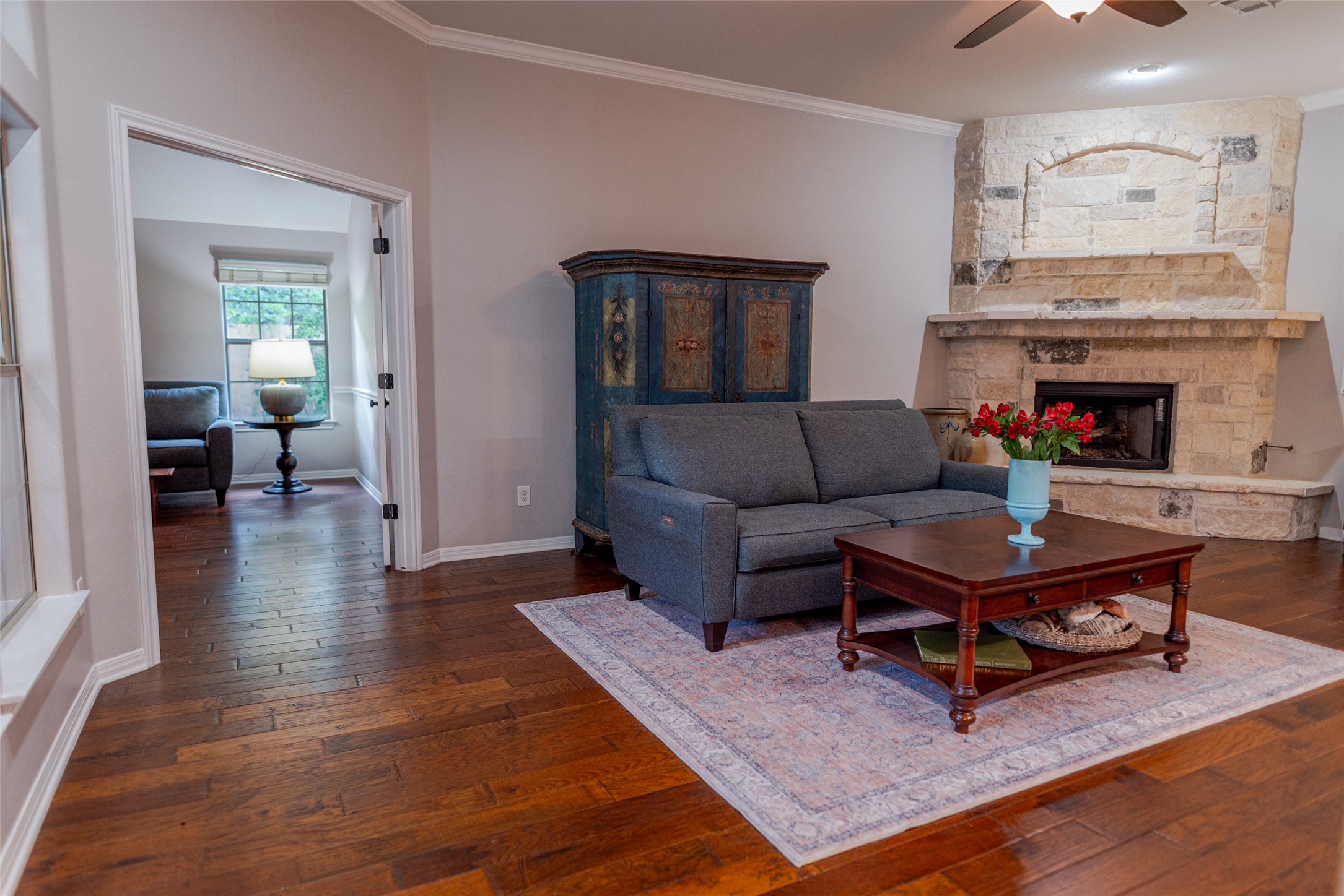 748 Nelson Ranch Road Cedar Park, TX 78613 - Photo 6 of 24 a living room with furniture and a fireplace