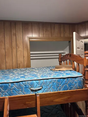 a view of kitchen with cabinets