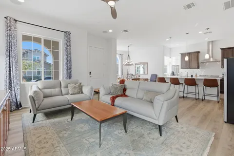 a kitchen with a sink stove and refrigerator