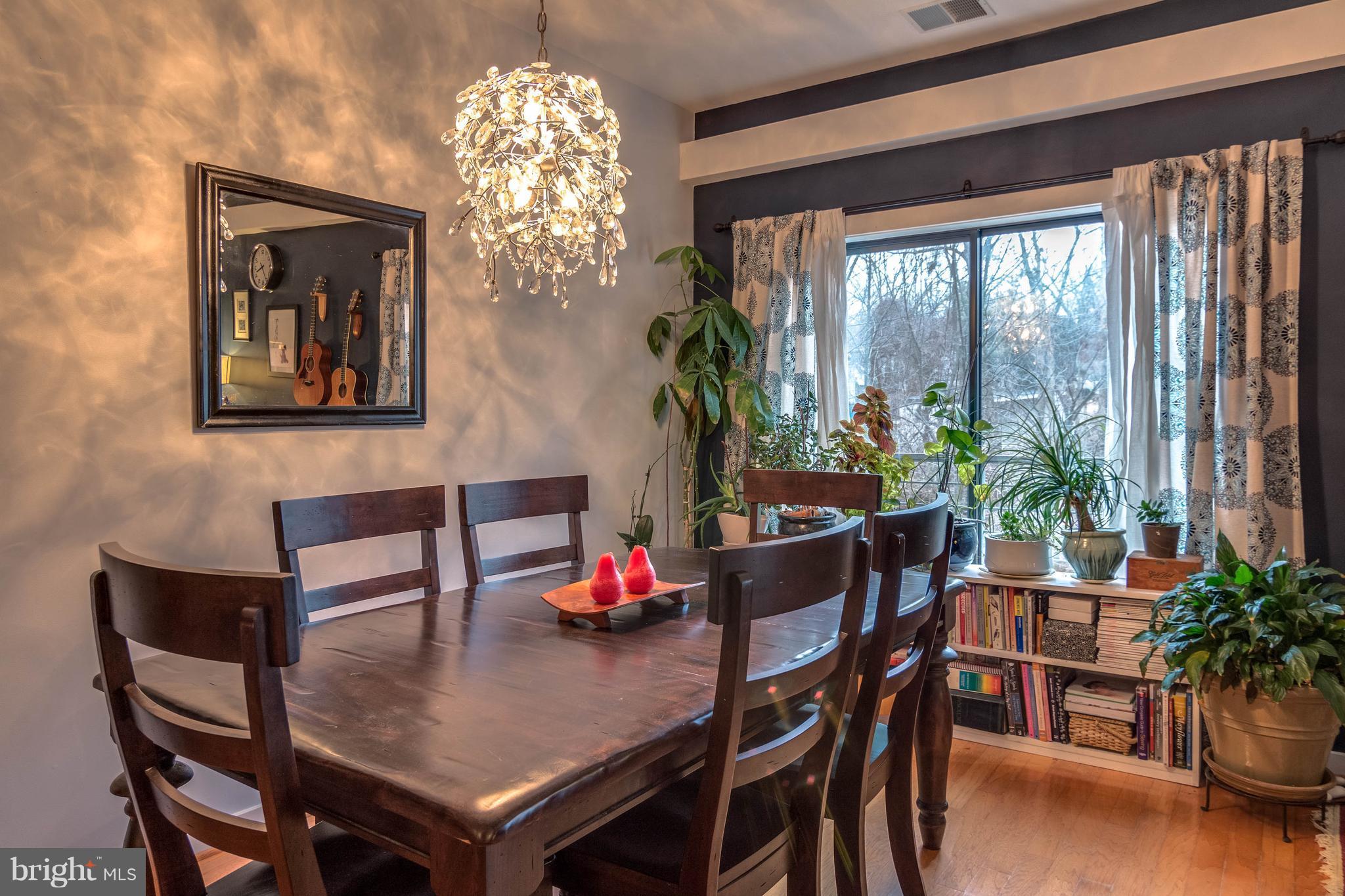 2007 Clipper Park Road, Unit 319 Baltimore, MD 21211 - Photo 8 of 29 a view of a dining room with furniture window and outside view