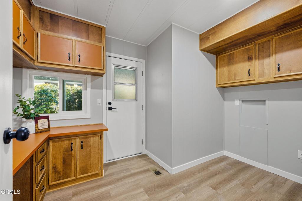 4700 Aurora Drive, Unit 16 Ventura, CA 93003 - Photo 21 of 28 a view of an entryway with wooden floor