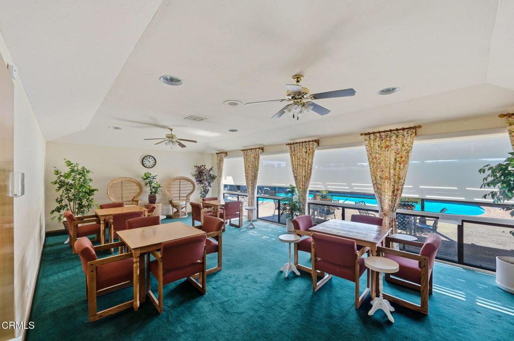 4700 Aurora Drive, Unit 16 Ventura, CA 93003 - Photo 24 of 28 a living room with furniture and a large window