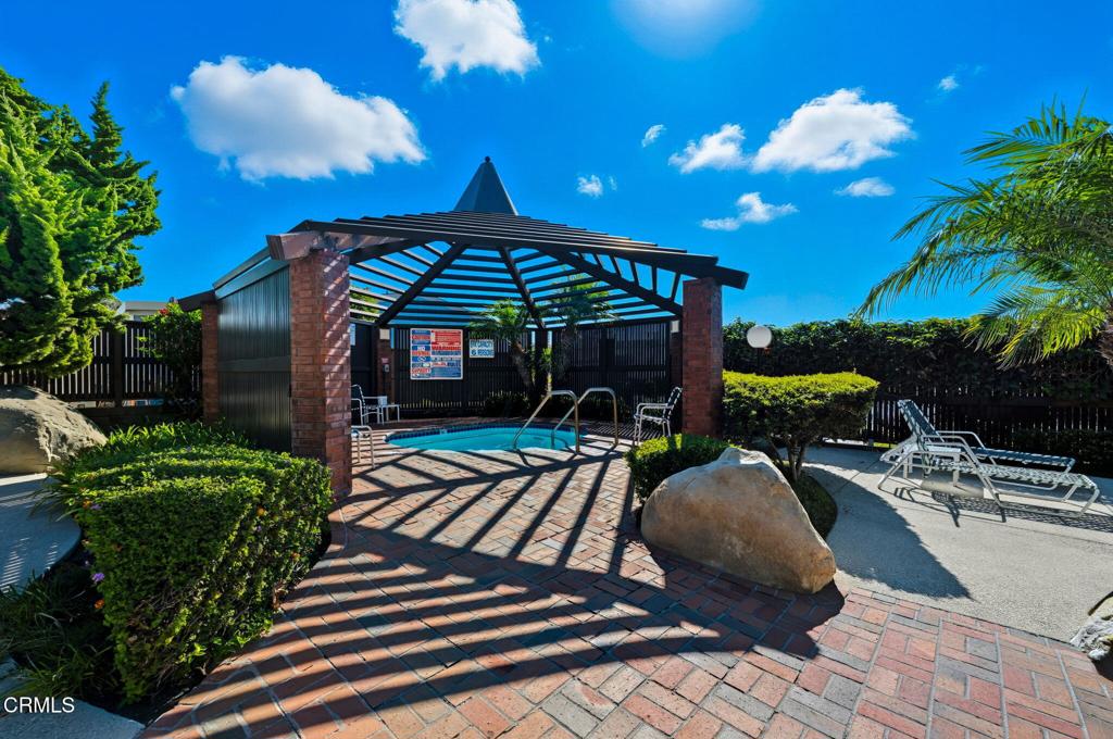 4700 Aurora Drive, Unit 16 Ventura, CA 93003 - Photo 27 of 28 a view of a porch with chairs and potted plants