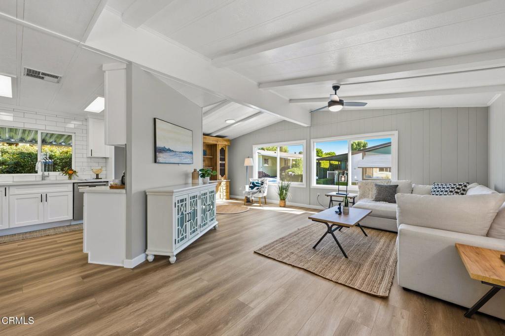 4700 Aurora Drive, Unit 16 Ventura, CA 93003 - Photo 5 of 28 a living room with furniture and a wooden floor