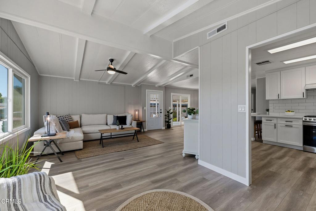 4700 Aurora Drive, Unit 16 Ventura, CA 93003 - Photo 6 of 28 a living room with furniture white walls and kitchen view