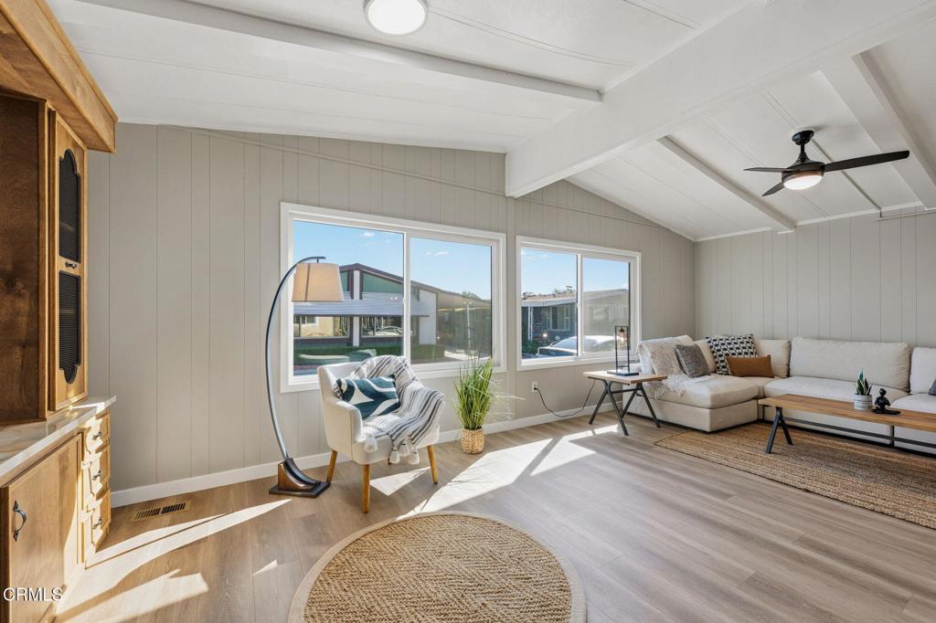 4700 Aurora Drive, Unit 16 Ventura, CA 93003 - Photo 7 of 28 a living room with furniture and a large window