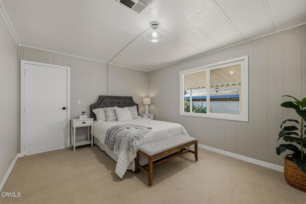4700 Aurora Drive, Unit 16 Ventura, CA 93003 - Photo 10 of 28 a bed room with a bed and a window