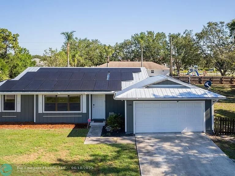 1181 Southwest Goodman Avenue Port St. Lucie, FL 34953 - Photo 1 of 25