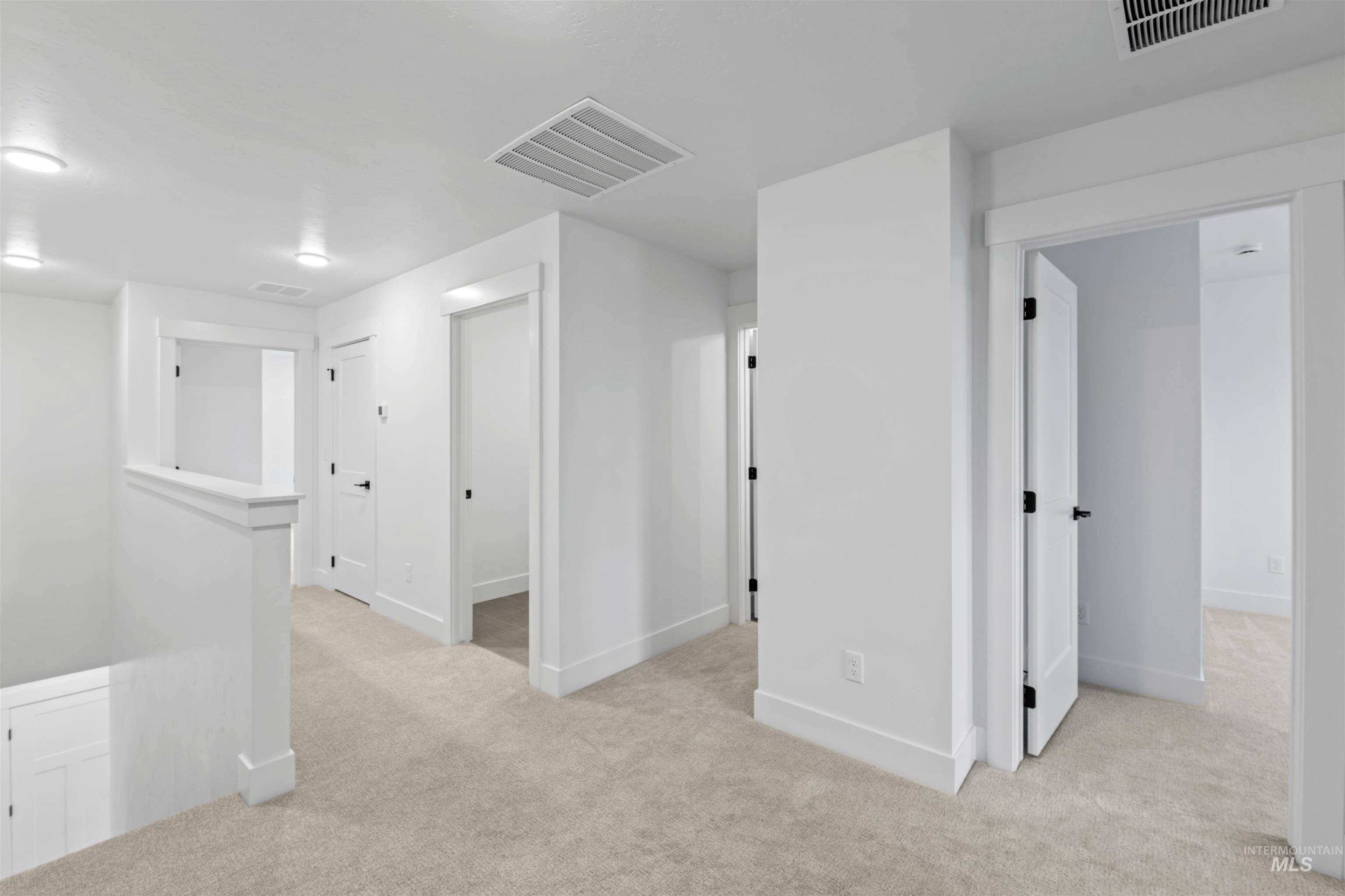 2168 East Deep Purple Lane Meridian, ID 83642 - Photo 11 of 15 Basement featuring light carpet and baseboards