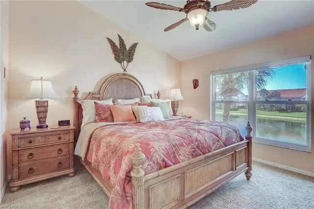 a bedroom with bed and window