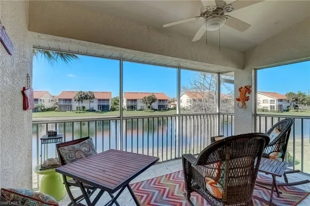 a view of a balcony with furniture