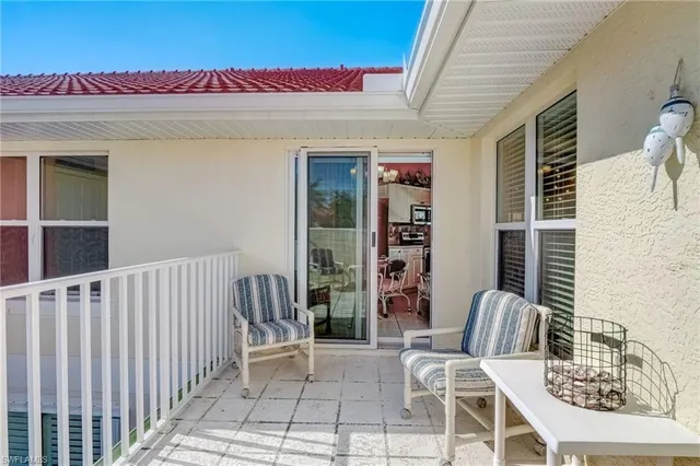a view of balcony and with furniture