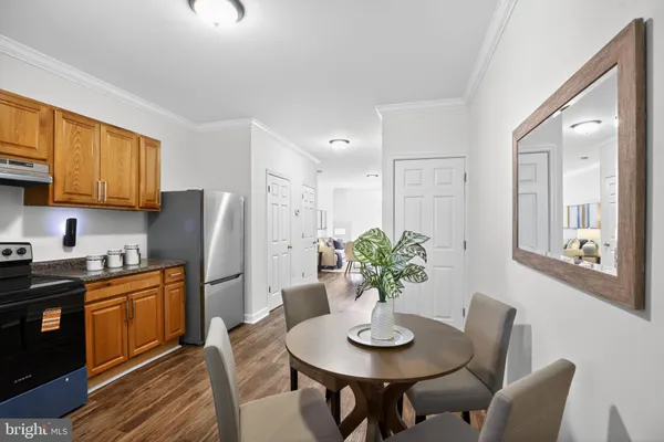 a view of a livingroom with furniture and wooden floor