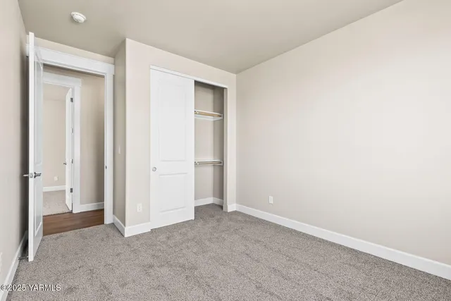 an empty room with closet