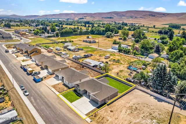 a view of a city with an ocean