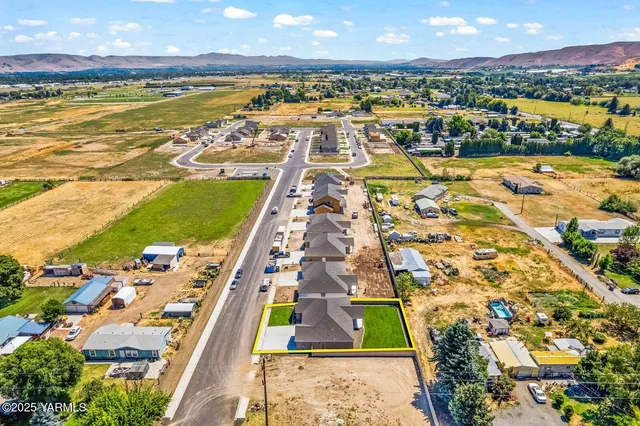 a view of a city with an ocean view