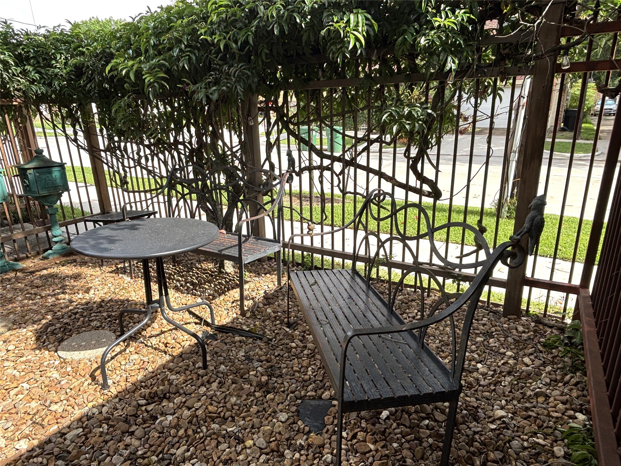 1840 Branard Street, Unit 2 Houston, TX 77098 - Photo 11 of 12 Outdoor seating in corner of yard.