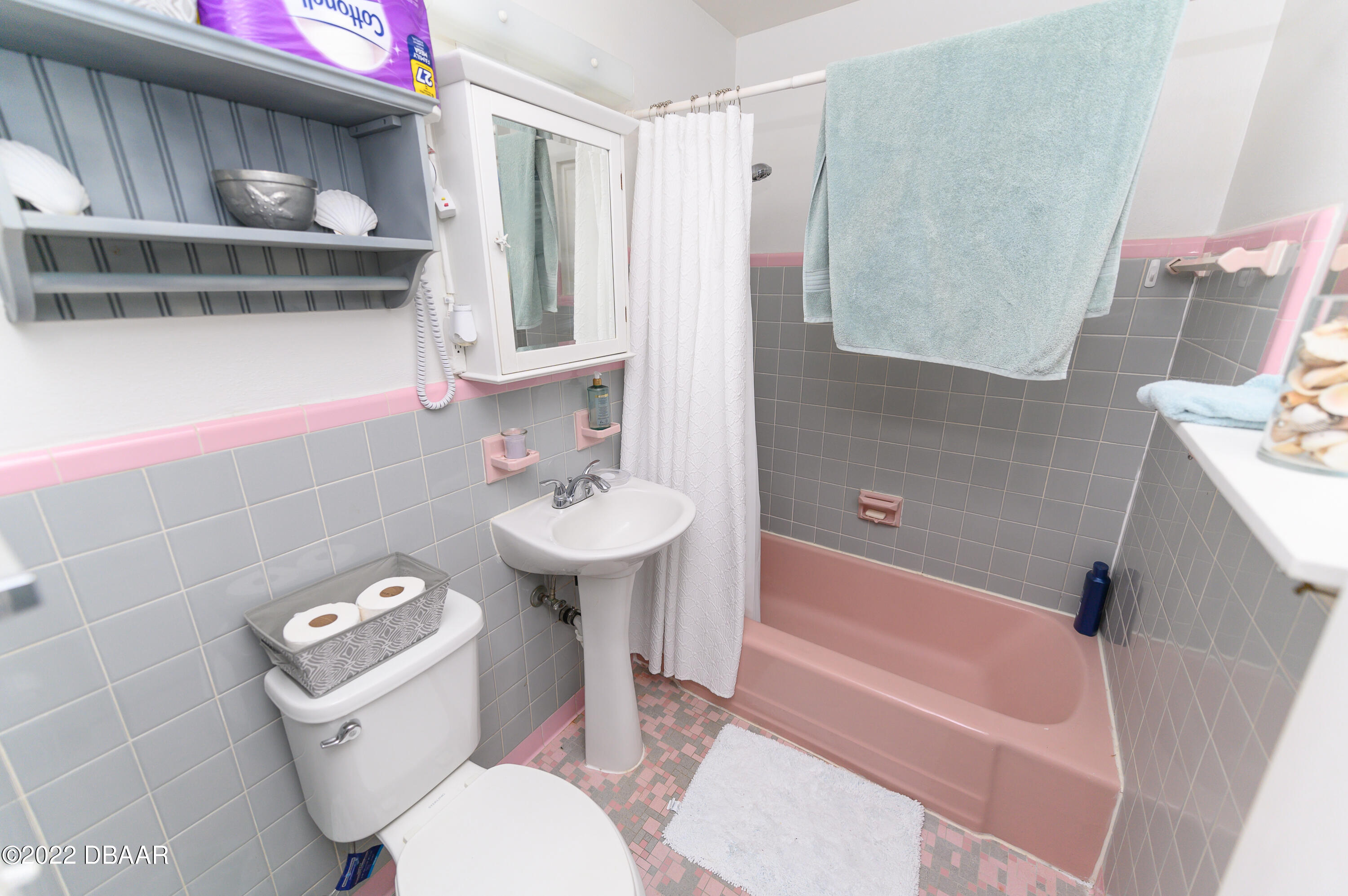 56 Margaret Road Ormond Beach, FL 32176 - Photo 26 of 32 a bathroom with a sink toilet and shower