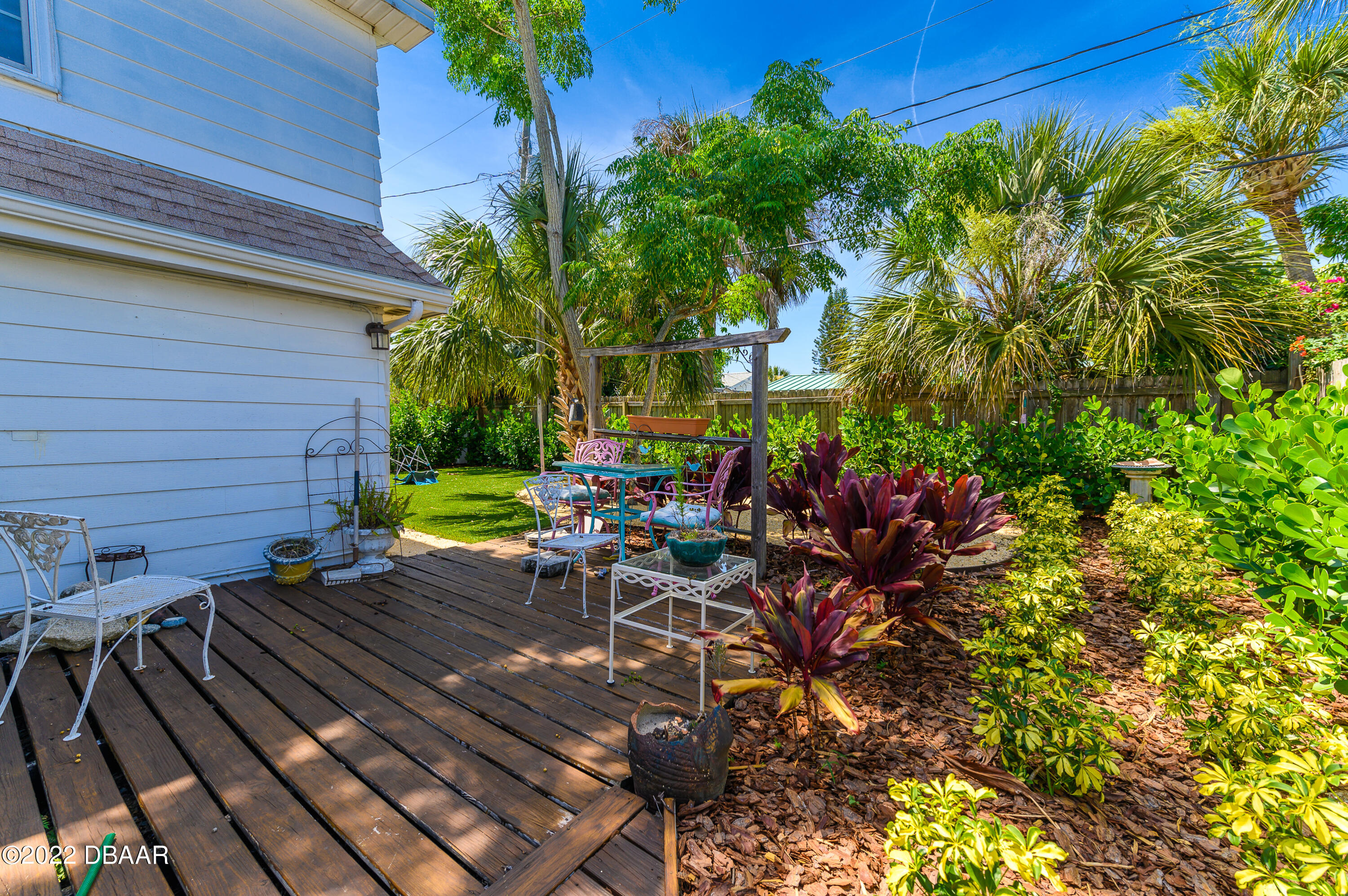 56 Margaret Road Ormond Beach, FL 32176 - Photo 7 of 32 a view of a backyard with sitting area