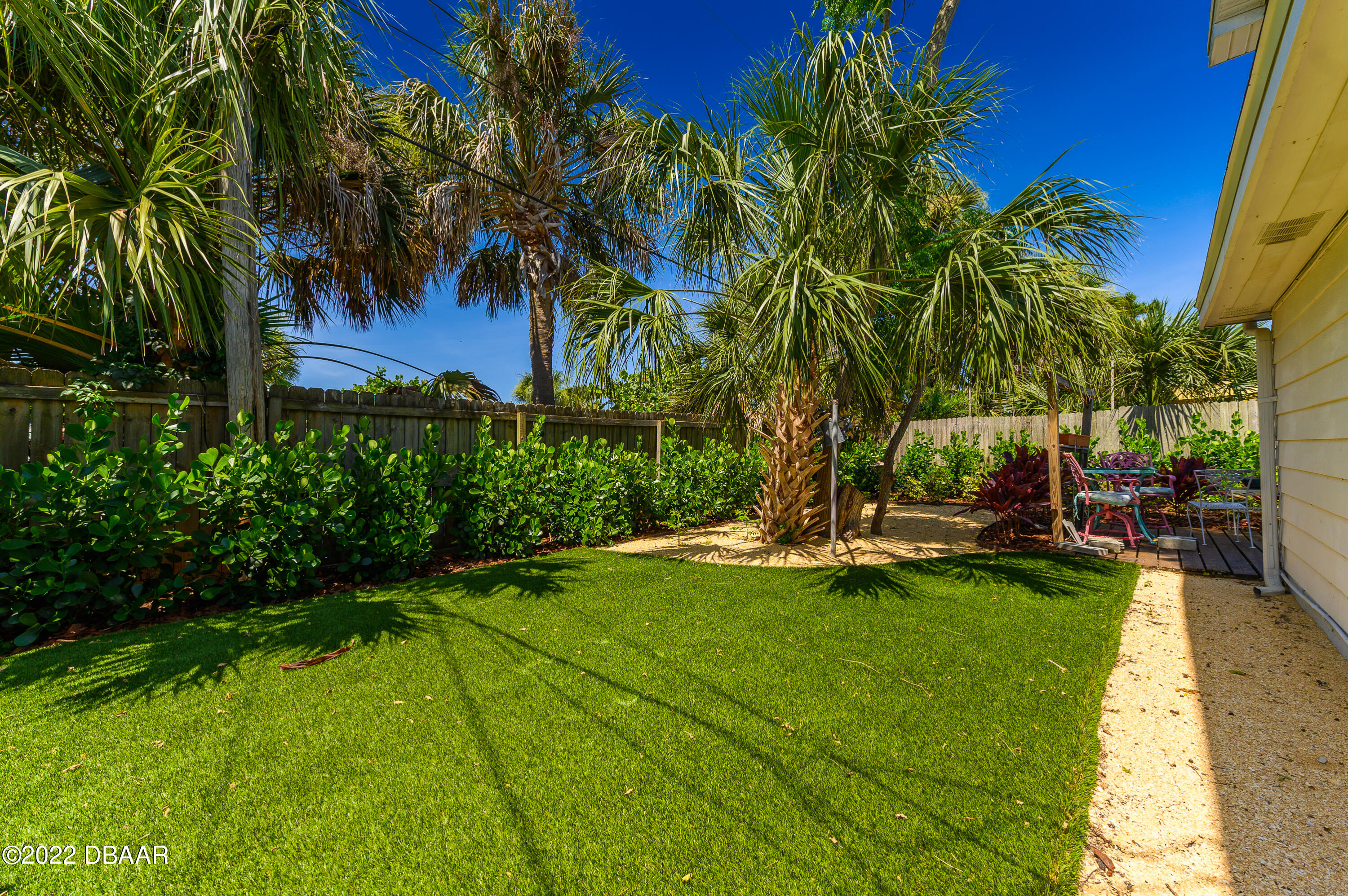 56 Margaret Road Ormond Beach, FL 32176 - Photo 8 of 32 a view of a backyard with a garden