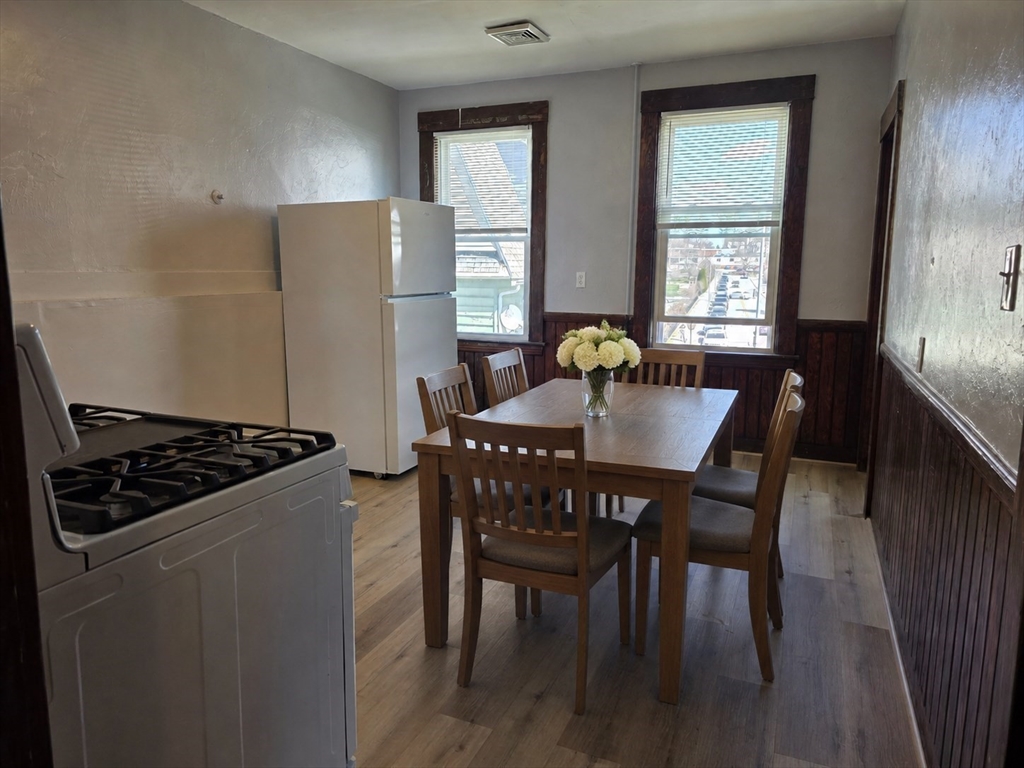 2 Hillside Street, Unit 3 Worcester, MA 01610 - Photo 7 of 30 a view of a dining room with furniture and window