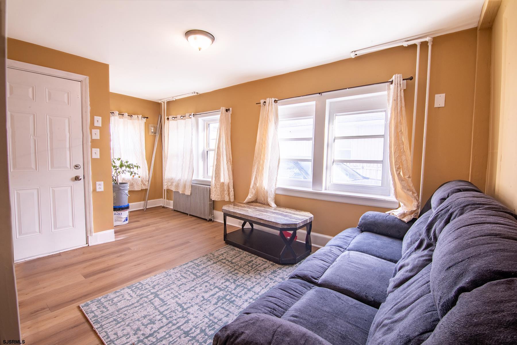 638 Wisteria Road Atlantic City, NJ 08401 - Photo 15 of 33 a living room with furniture and a window