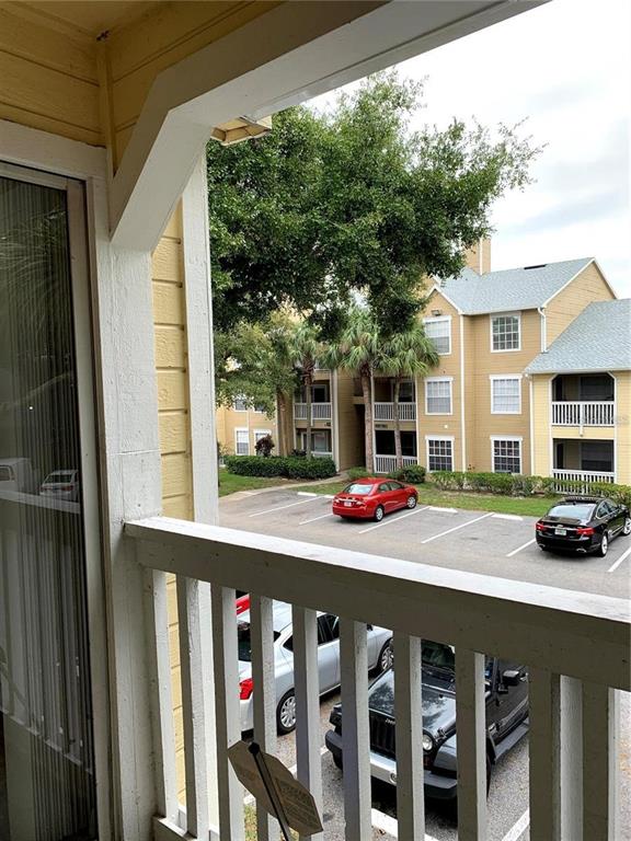 1081 South Hiawassee Road, Unit 723 Orlando, FL 32835 - Photo 11 of 18 a view of a car park in front of house