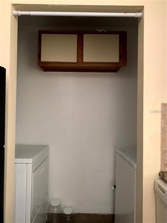 1081 South Hiawassee Road, Unit 723 Orlando, FL 32835 - Photo 8 of 18 a bathroom with a sink and a mirror