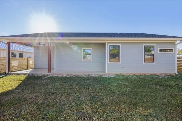 a view of backyard with hardwood