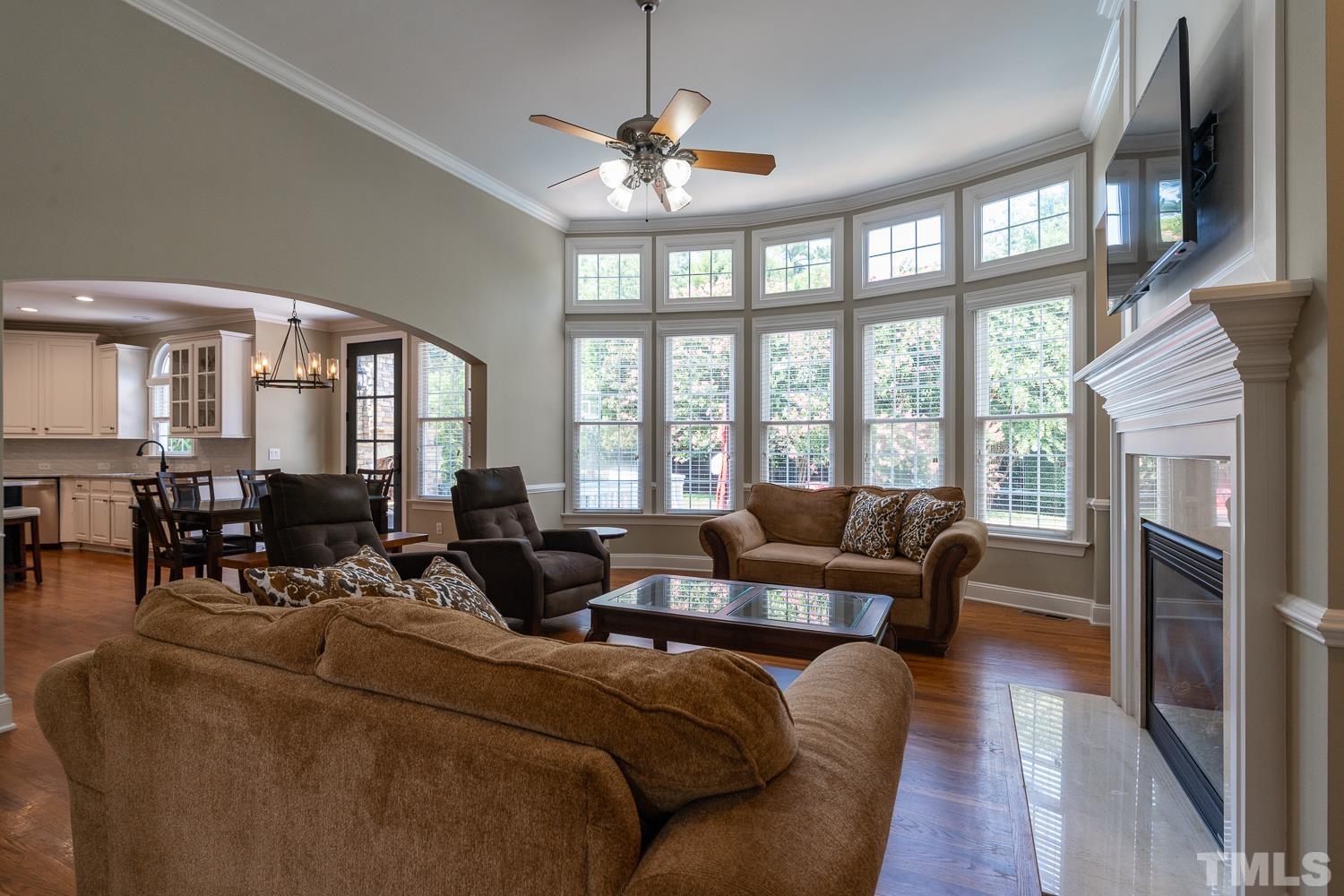 2001 Lowery Farm Lane Raleigh, NC 27614 - Photo 15 of 33 a living room with furniture fireplace and a large window
