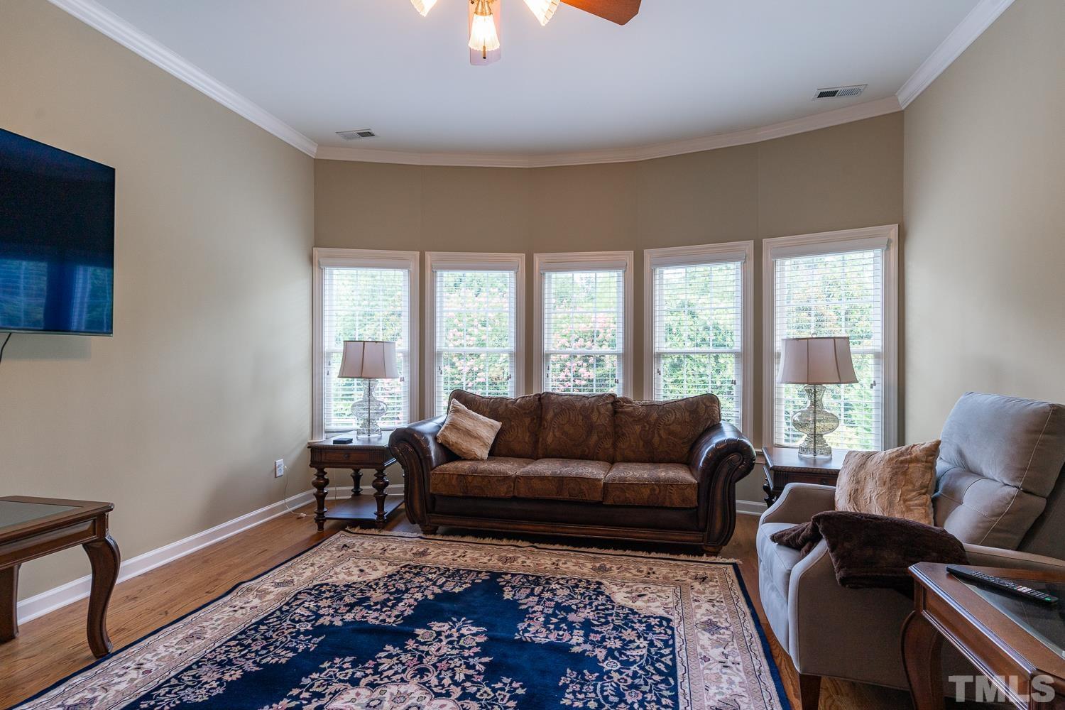 2001 Lowery Farm Lane Raleigh, NC 27614 - Photo 29 of 33 a living room with furniture and a large window