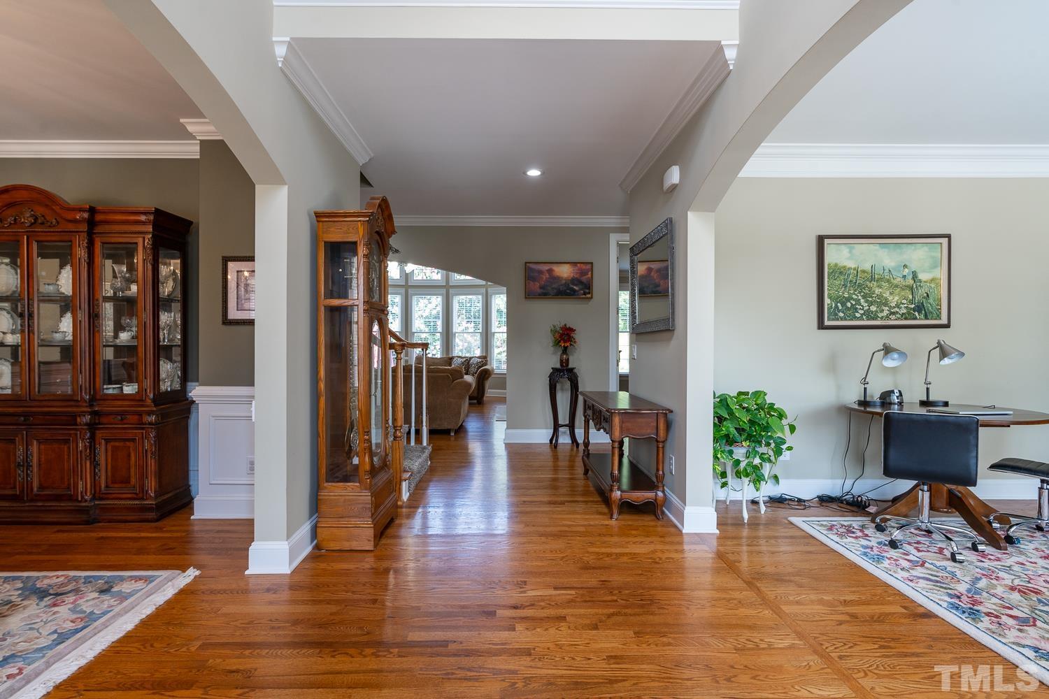 2001 Lowery Farm Lane Raleigh, NC 27614 - Photo 5 of 33 a living room with furniture and a wooden floor