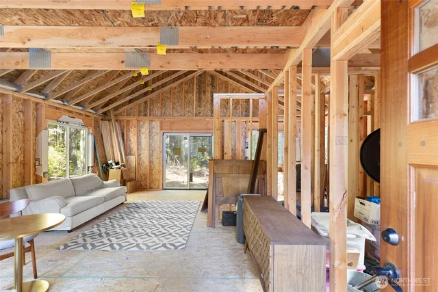 a view of a patio with couches chairs and potted plants