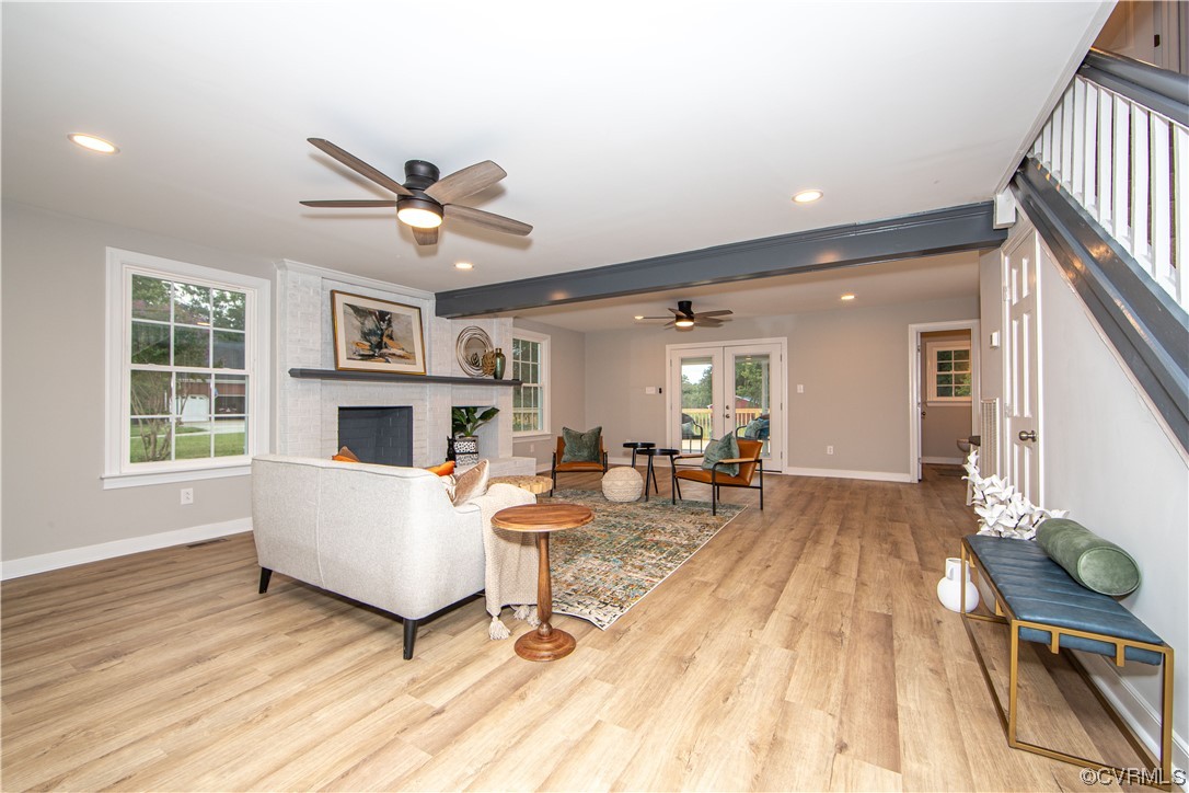 11611 Beach Road Chesterfield, VA 23838 - Photo 11 of 34 a living room with furniture and a fireplace