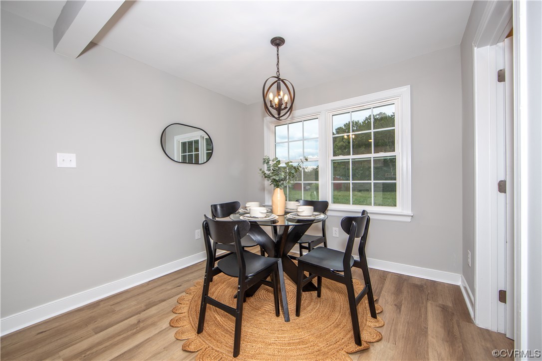 11611 Beach Road Chesterfield, VA 23838 - Photo 14 of 34 a view of a dining room with furniture window and wooden floor