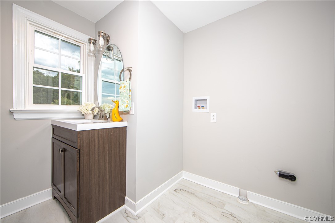 11611 Beach Road Chesterfield, VA 23838 - Photo 24 of 34 a bathroom with a sink and a window
