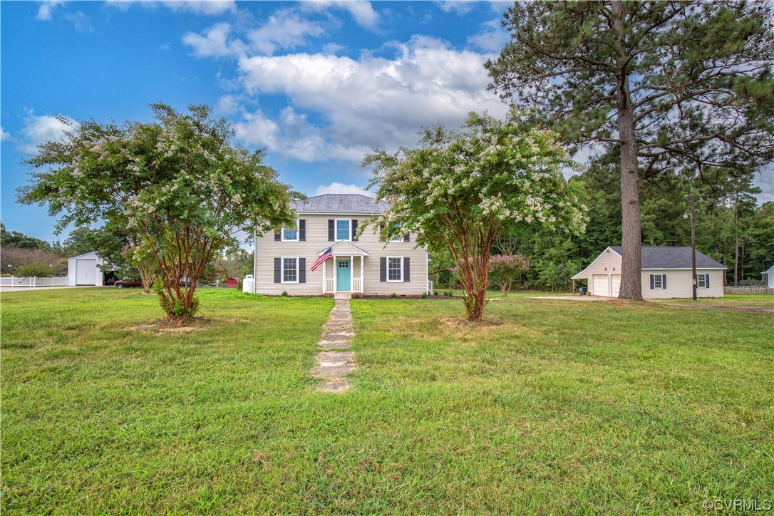 11611 Beach Road Chesterfield, VA 23838 - Photo 4 of 34 a front view of a house with garden