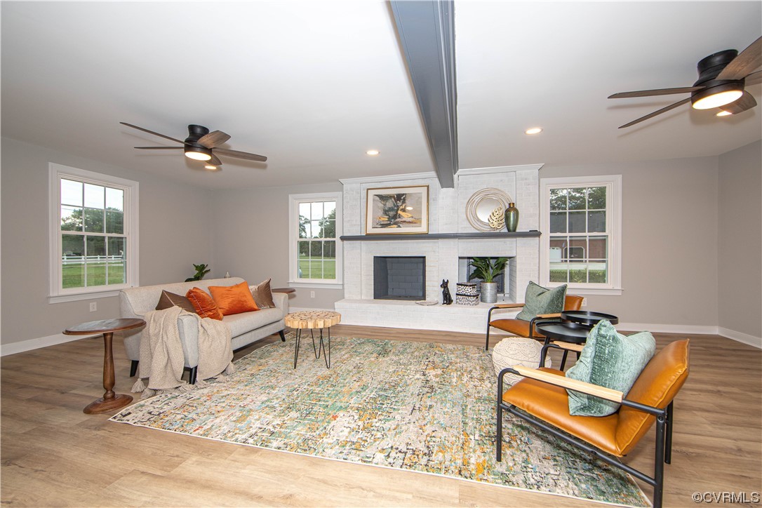11611 Beach Road Chesterfield, VA 23838 - Photo 6 of 34 a living room with furniture and a fireplace