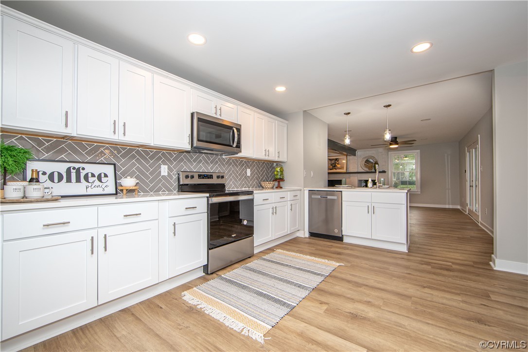 11611 Beach Road Chesterfield, VA 23838 - Photo 8 of 34 a kitchen with granite countertop a sink cabinets and stainless steel appliances