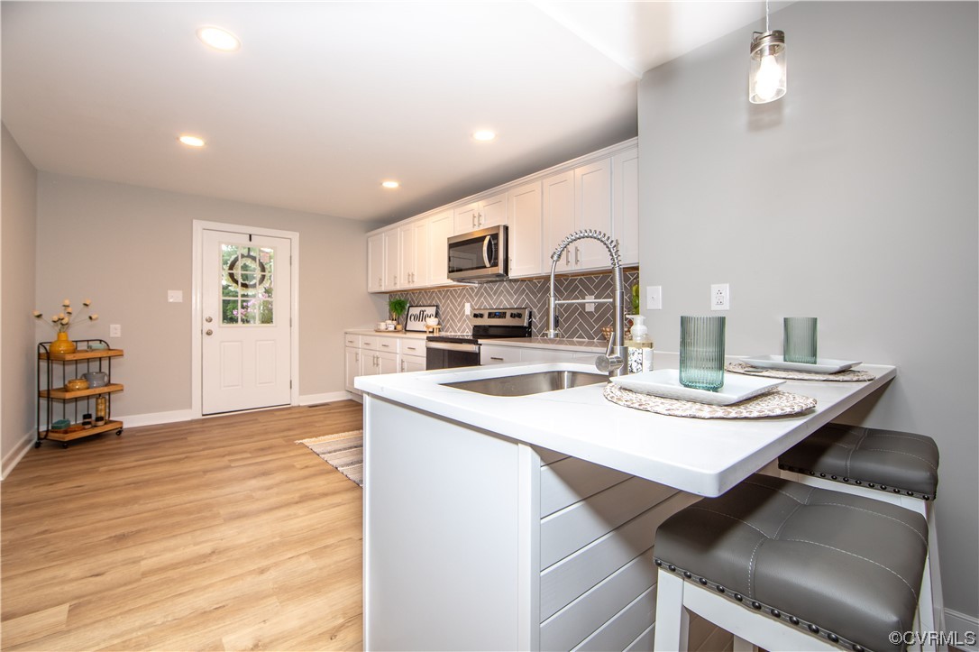 11611 Beach Road Chesterfield, VA 23838 - Photo 10 of 34 a view of kitchen with sink and wooden floor