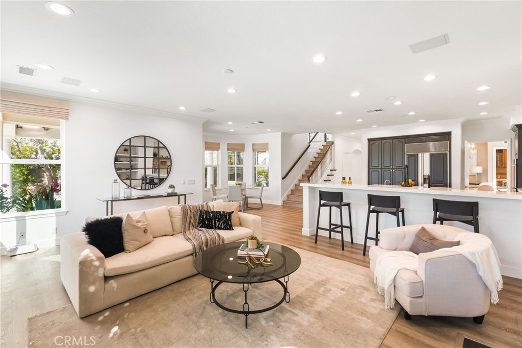 20112 Vía Cellini Porter Ranch, CA 91326 - Photo 20 of 64 a living room with furniture and a large window