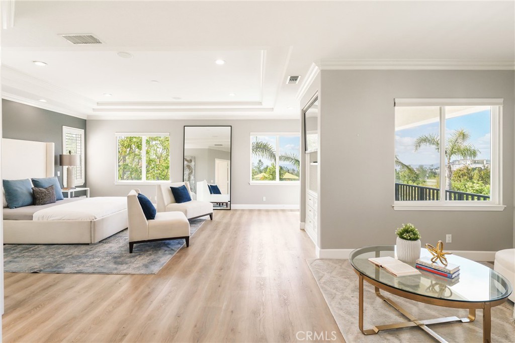 20112 Vía Cellini Porter Ranch, CA 91326 - Photo 25 of 64 a living room with furniture and a large window