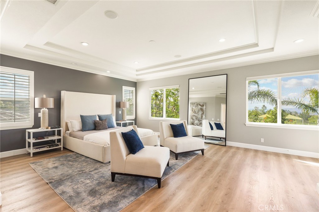 20112 Vía Cellini Porter Ranch, CA 91326 - Photo 26 of 64 a living room with furniture and a large window
