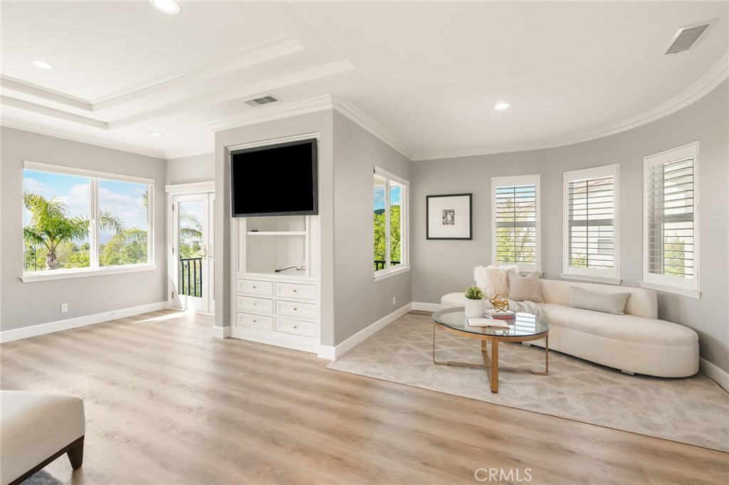 20112 Vía Cellini Porter Ranch, CA 91326 - Photo 28 of 64 a living room with furniture and a flat screen tv
