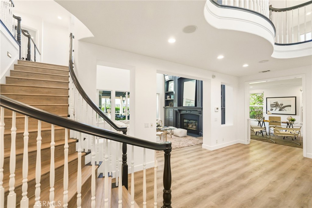 20112 Vía Cellini Porter Ranch, CA 91326 - Photo 3 of 64 a view of an entryway with wooden floor