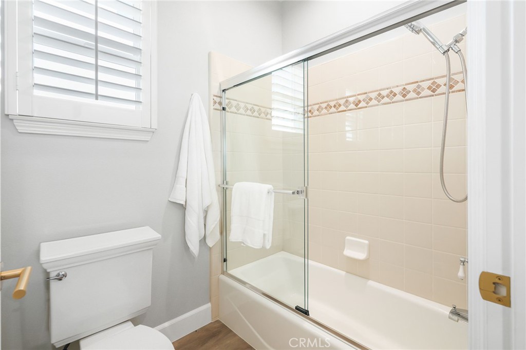 20112 Vía Cellini Porter Ranch, CA 91326 - Photo 44 of 64 a bathroom with a shower and a toilet