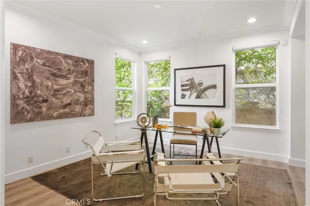 a view of a patio with a table and chairs