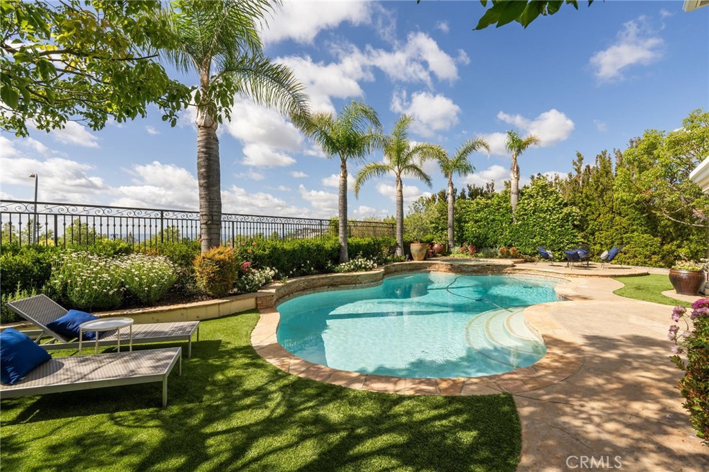 20112 Vía Cellini Porter Ranch, CA 91326 - Photo 56 of 64 a view of a swimming pool with a patio